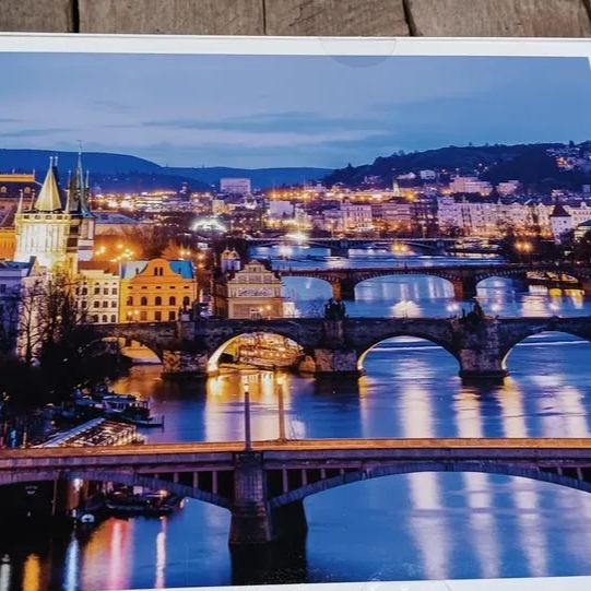 Prague Cityscape 1000-Piece Puzzle – Glowing River View, 27x21.5in