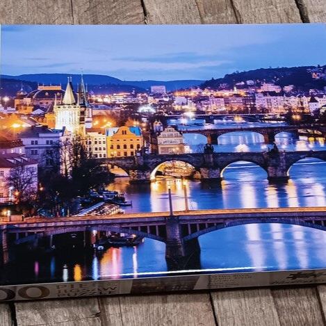 Prague Cityscape 1000-Piece Puzzle – Glowing River View, 27x21.5in