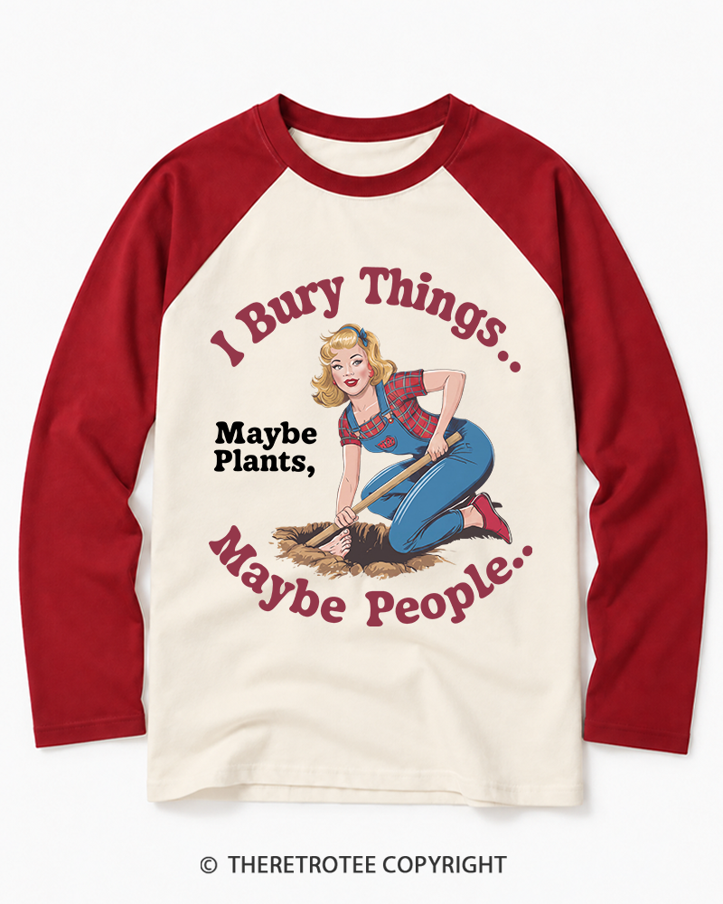 TheRetroTee I Bury Things 1970s Long Sleeve Raglan T-Shirt