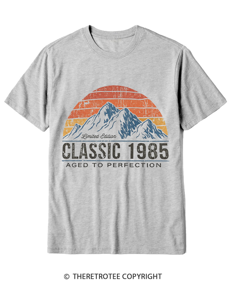 TheRetroTee 1985 Classic Mountain & Sunset Personalized Custom Year 1980s Cotton T-Shirt