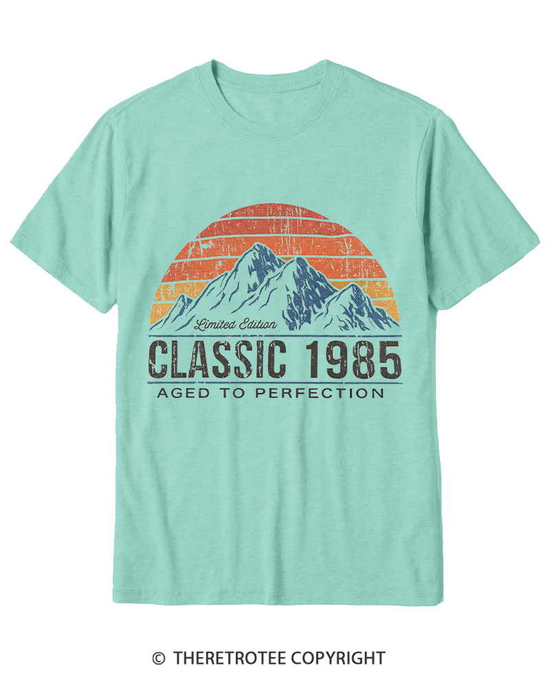 TheRetroTee 1985 Classic Mountain & Sunset Personalized Custom Year 1980s Cotton T-Shirt