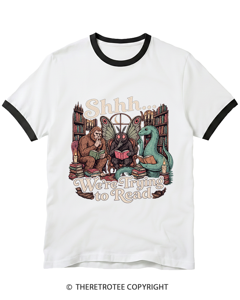 TheRetroTee Shhh We're Trying to Read Cryptid 1970s Ringer T-Shirt