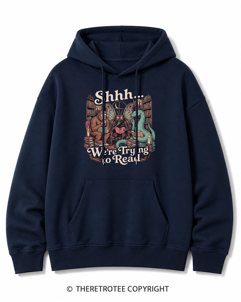 TheRetroTee Shhh We're Trying to Read Cryptid 1970s Halloween Cotton Hoodie