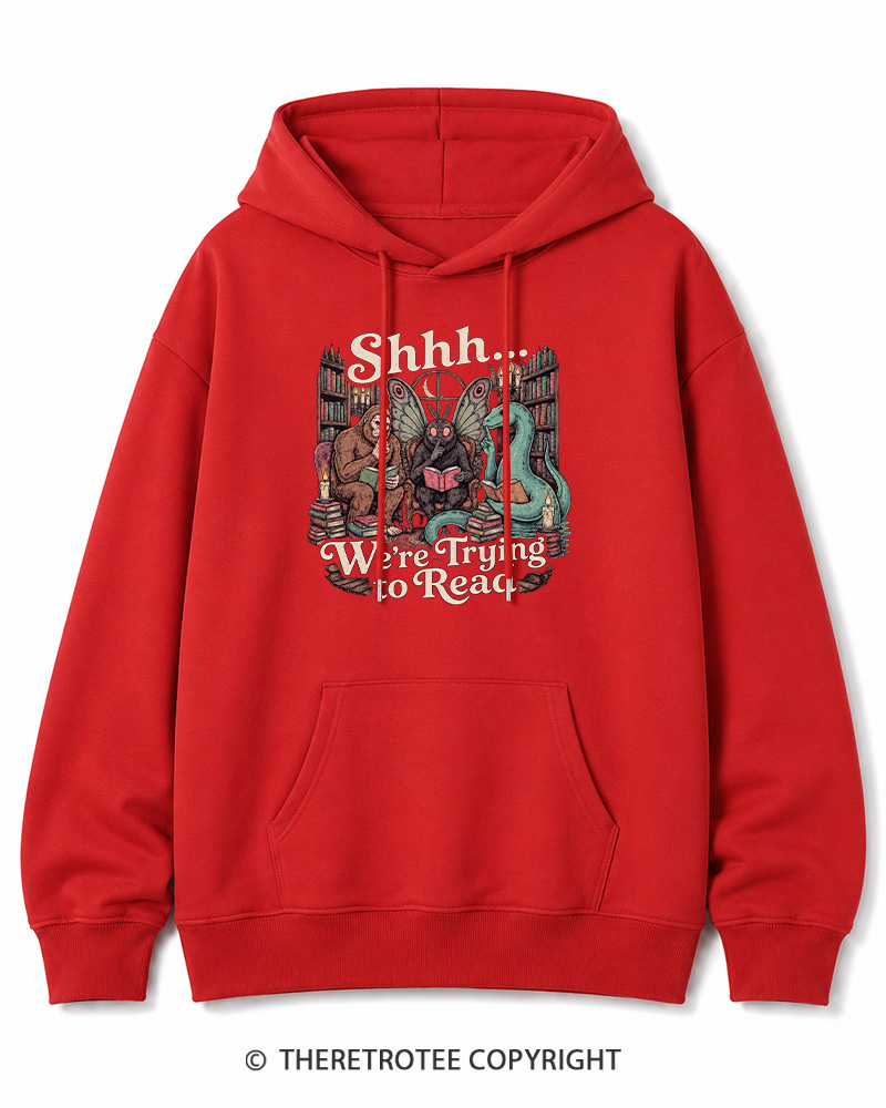 TheRetroTee Shhh We're Trying to Read Cryptid 1970s Halloween Cotton Hoodie