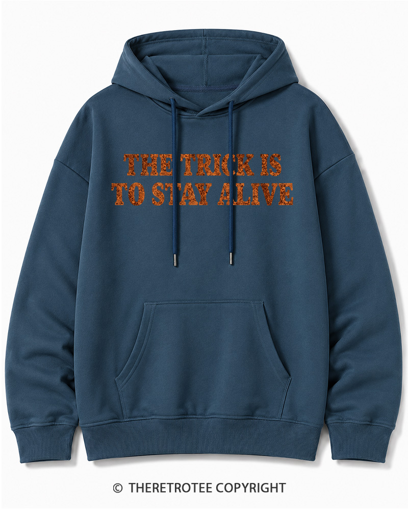 TheRetroTee The Trick Is To Stay Alive 1970s Halloween Halloween Cotton Hoodie