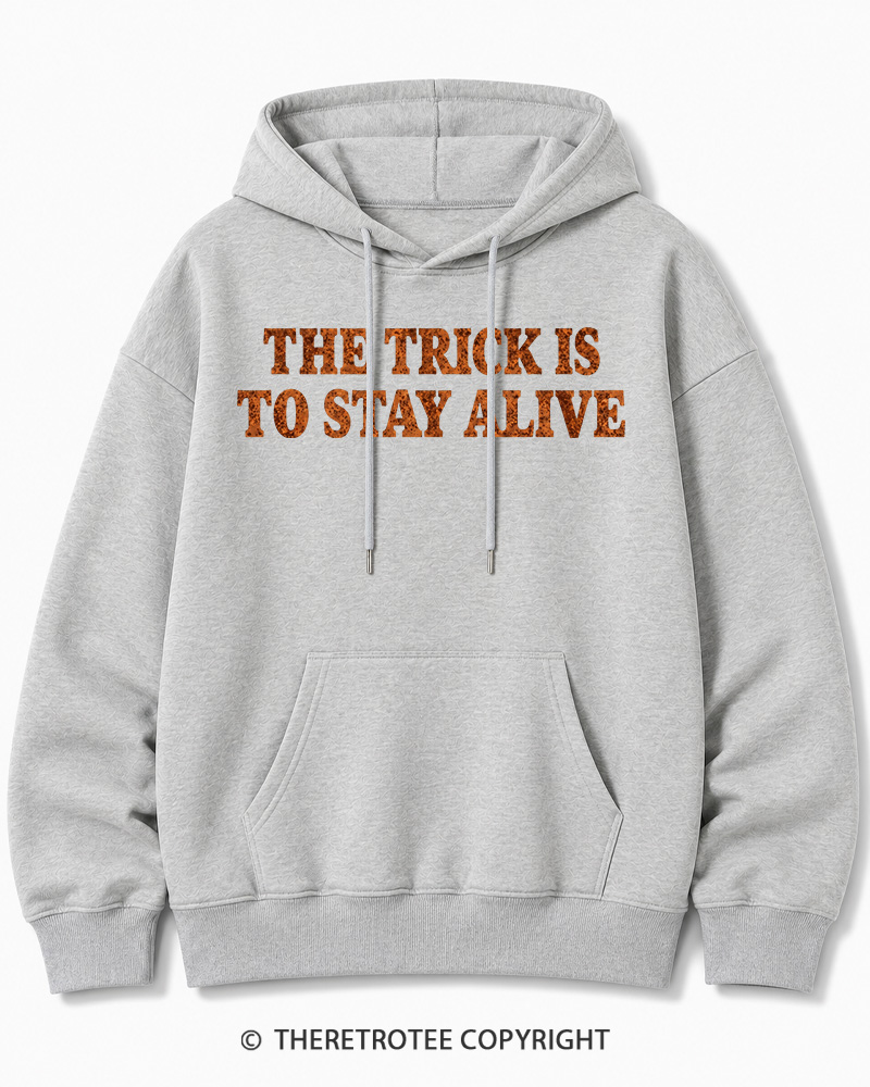 TheRetroTee The Trick Is To Stay Alive 1970s Halloween Halloween Cotton Hoodie