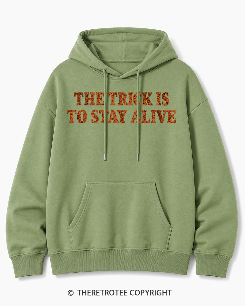 TheRetroTee The Trick Is To Stay Alive 1970s Halloween Halloween Cotton Hoodie