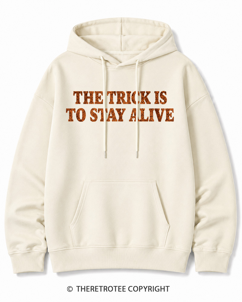 TheRetroTee The Trick Is To Stay Alive 1970s Halloween Halloween Cotton Hoodie