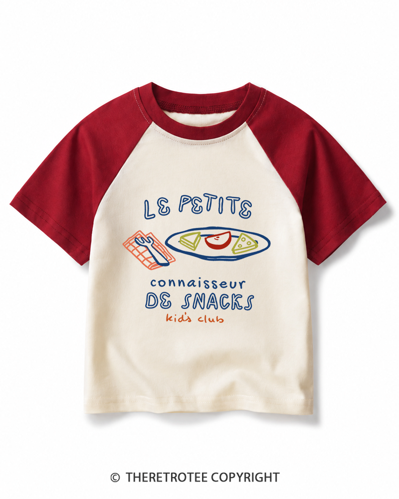 TheRetroTee Le Petit Connaisseur de Snacks Kids Club 1970s Kids Raglan Baseball T-Shirt