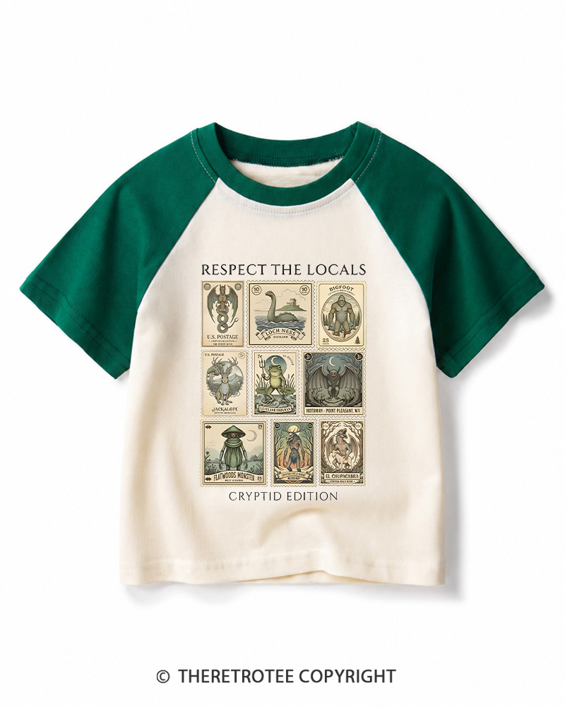 TheRetroTee Cryptid Stamp Graphic 1970s Kids Raglan Baseball T-Shirt