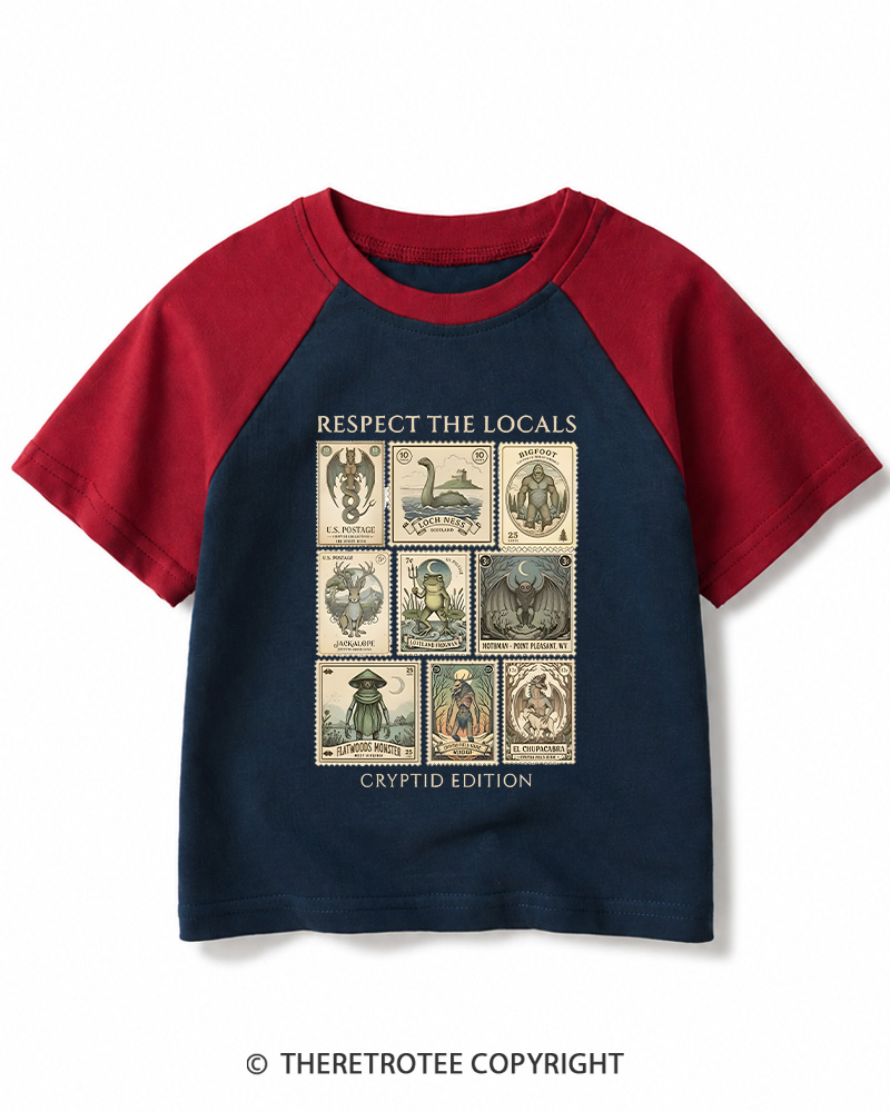 TheRetroTee Cryptid Stamp Graphic 1970s Kids Raglan Baseball T-Shirt
