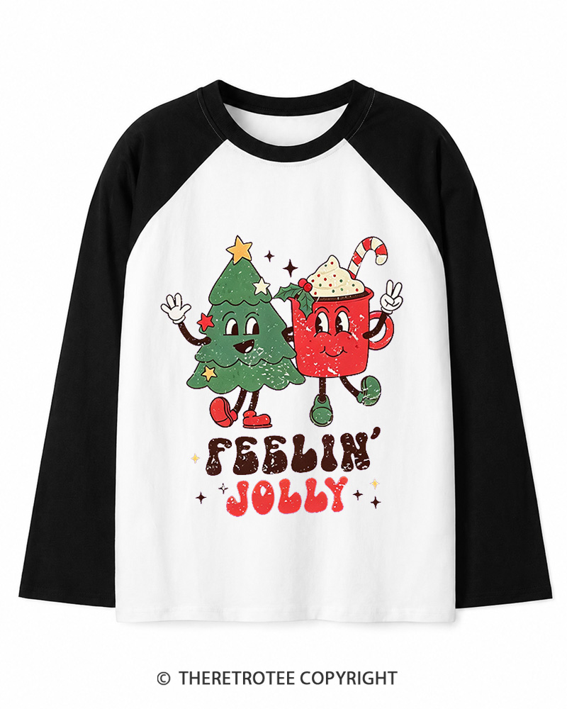 TheRetroTee Feelin’ Jolly 1970s Christmas Long Sleeve Raglan T-Shirt