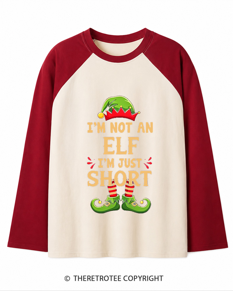 TheRetroTee I’m Just Short Christmas Long Sleeve Raglan T-Shirt