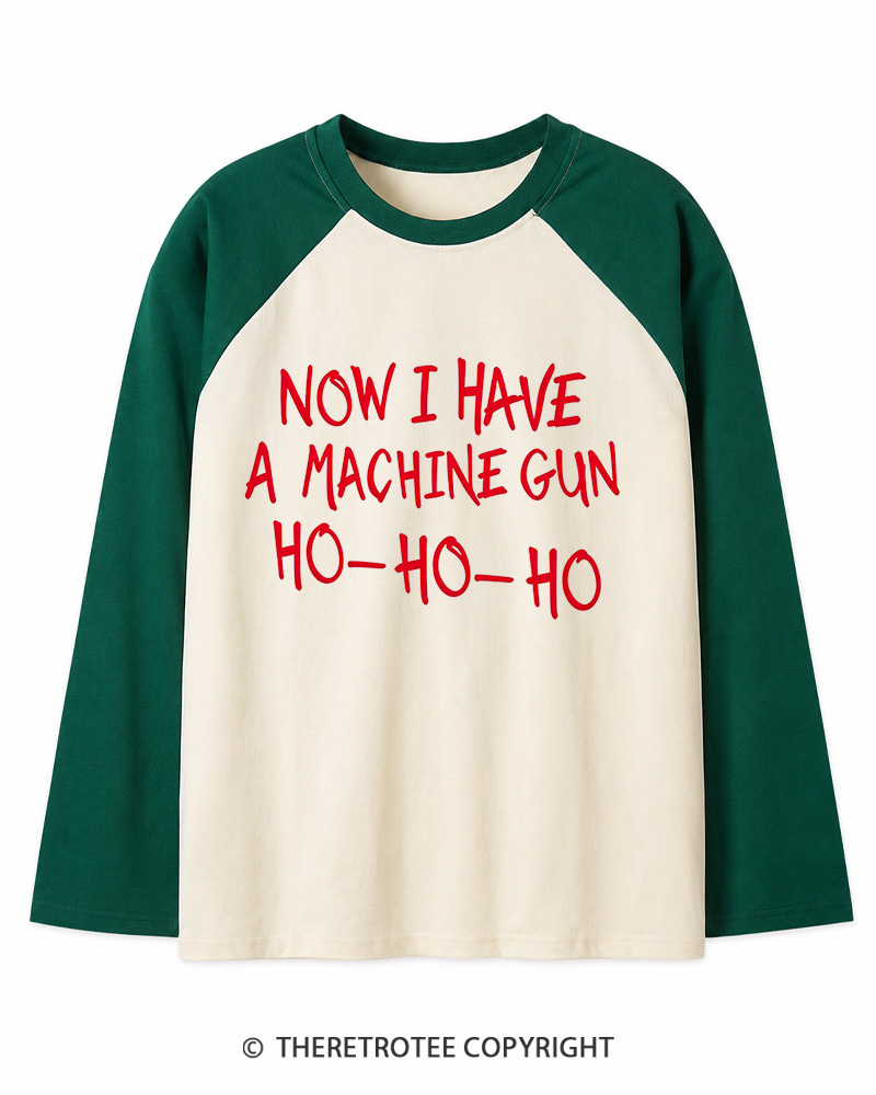TheRetroTee Now I Have A Machine Gun Ho-Ho-Ho 1980s Christmas Long Sleeve Raglan T-Shirt