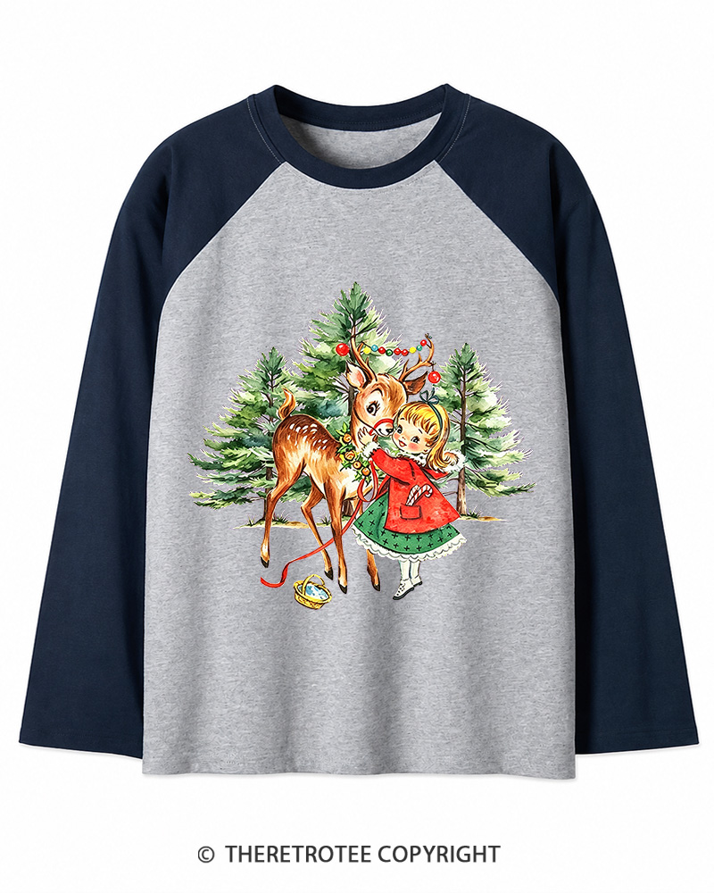 TheRetroTee Vintage Christmas Girl and Reindeer 1950s Christmas Long Sleeve Raglan T-Shirt