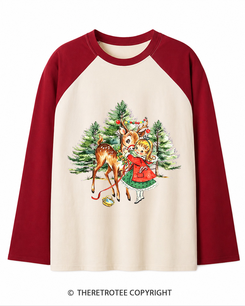 TheRetroTee Vintage Christmas Girl and Reindeer 1950s Christmas Long Sleeve Raglan T-Shirt