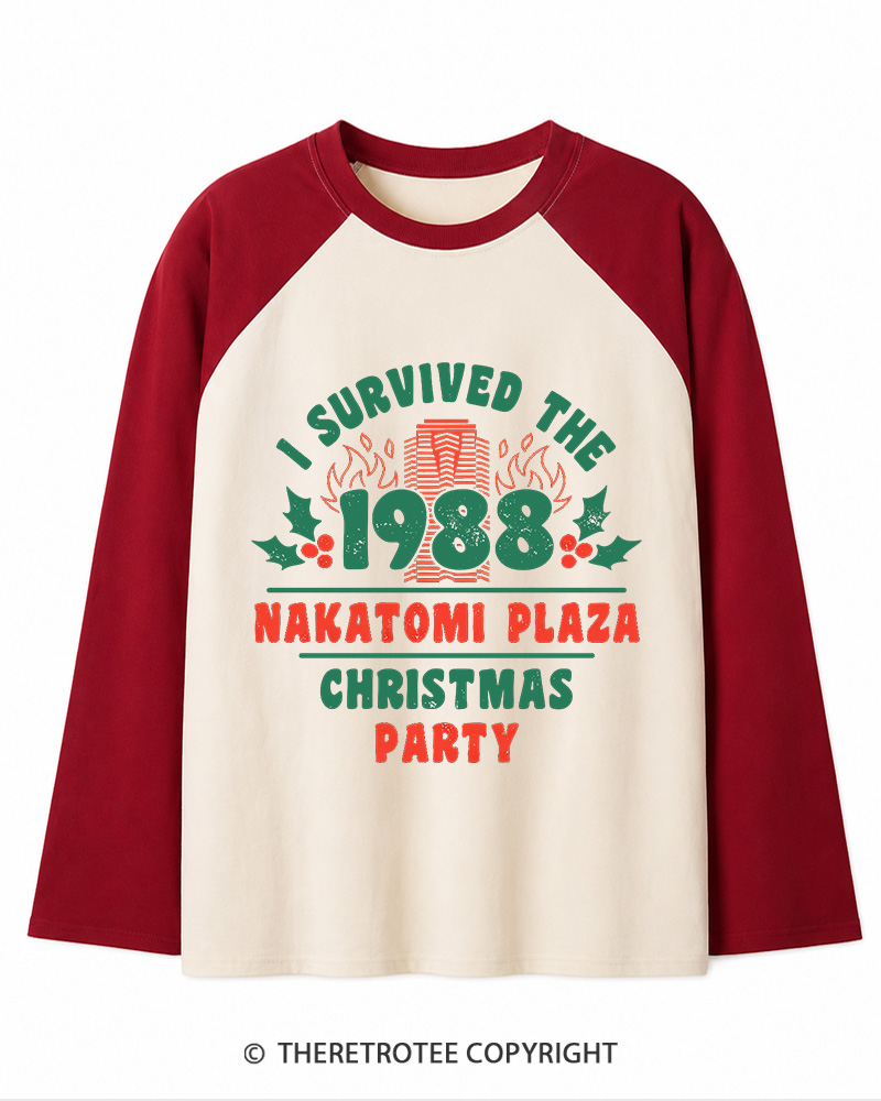 TheRetroTee I Survived the 1988 Nakatomi Plaza Christmas Party Vintage Christmas Long Sleeve Raglan T-Shirt
