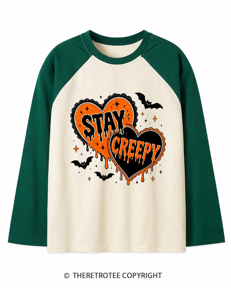 TheRetroTee Stay Creepy 1990s Long Sleeve Raglan T-Shirt