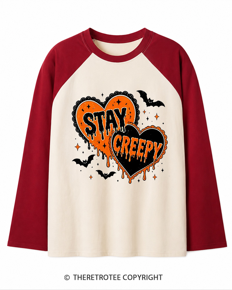 TheRetroTee Stay Creepy 1990s Long Sleeve Raglan T-Shirt