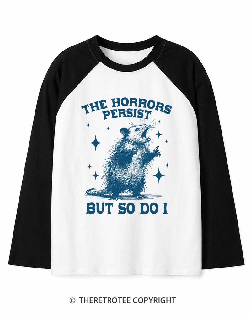 TheRetroTee The Horrors Persist But So Do I 1970s Long Sleeve Raglan T-Shirt