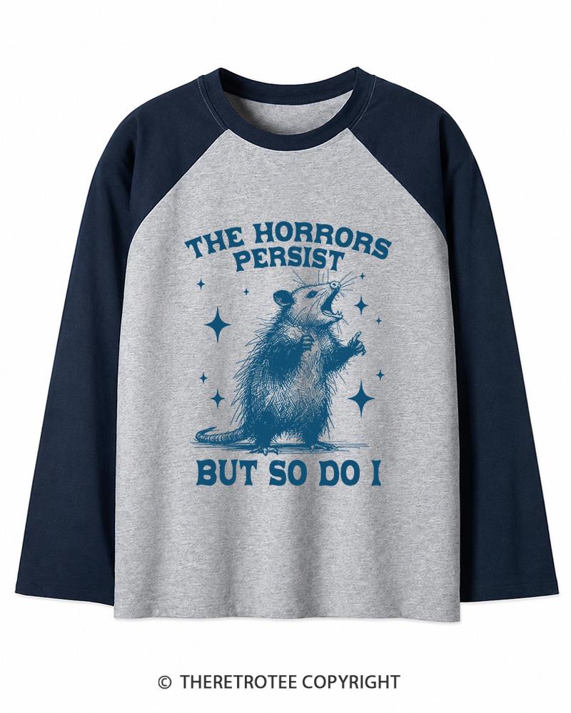 TheRetroTee The Horrors Persist But So Do I 1970s Long Sleeve Raglan T-Shirt