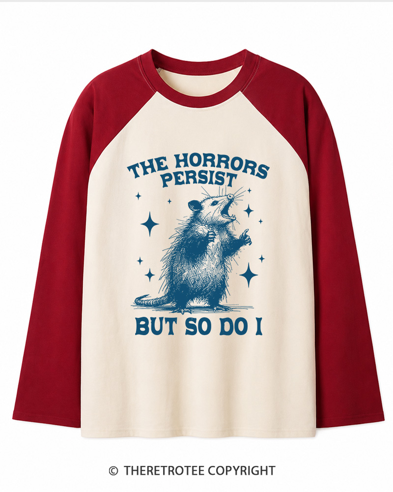 TheRetroTee The Horrors Persist But So Do I 1970s Long Sleeve Raglan T-Shirt