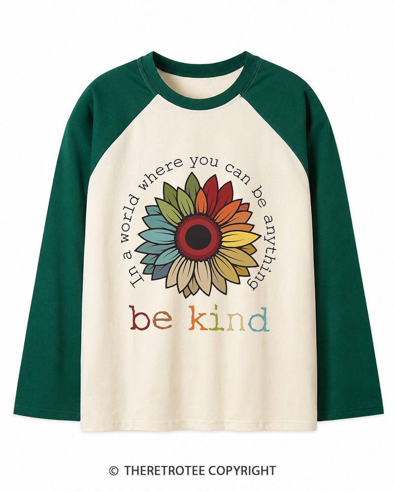 TheRetroTee In A World Where You Can Be Anything 1970s Long Sleeve Raglan T-Shirt