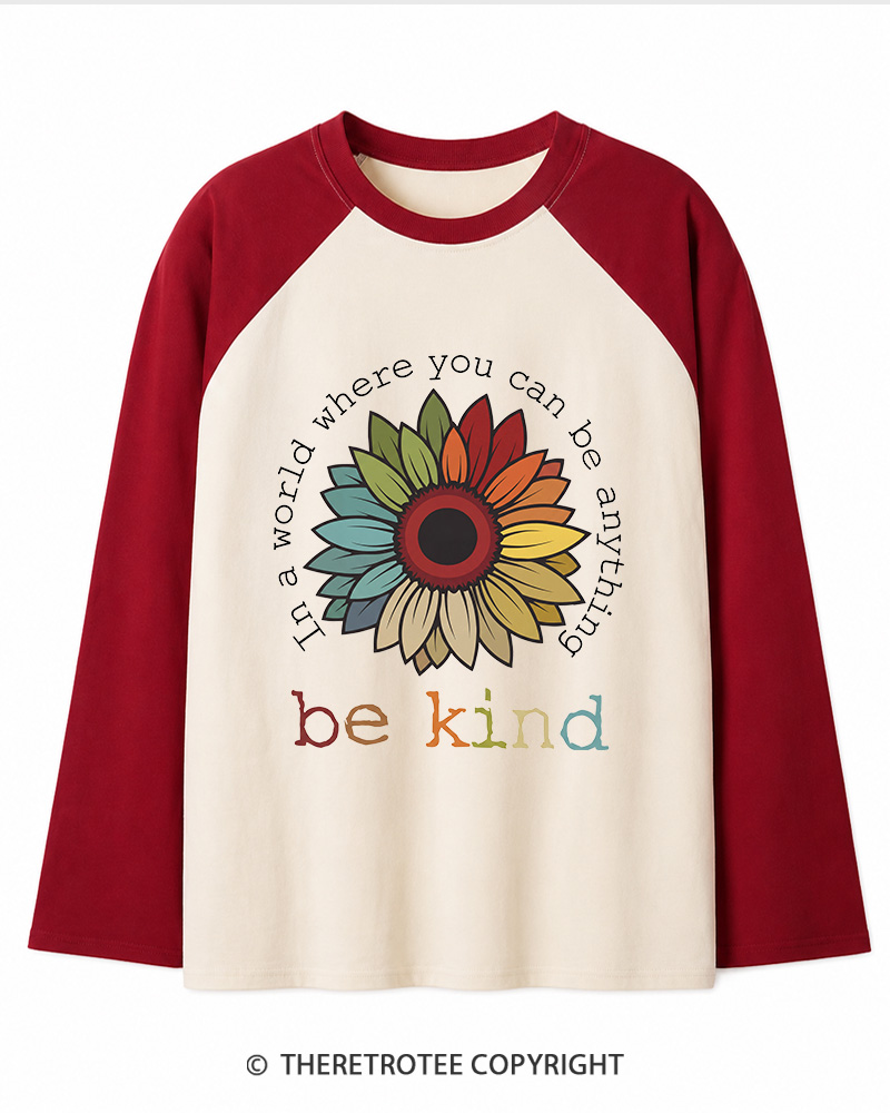 TheRetroTee In A World Where You Can Be Anything 1970s Long Sleeve Raglan T-Shirt