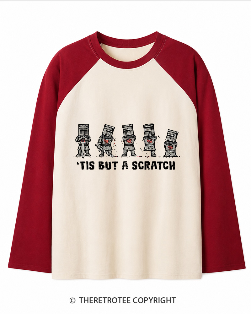 TheRetroTee Tis But A Scratch 1970s Long Sleeve Raglan T-Shirt