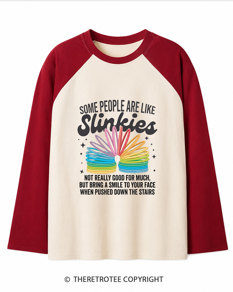 TheRetroTee Some People Are Like Slinkies Funny Sarcastic Quote 1980s Long Sleeve Raglan T-Shirt
