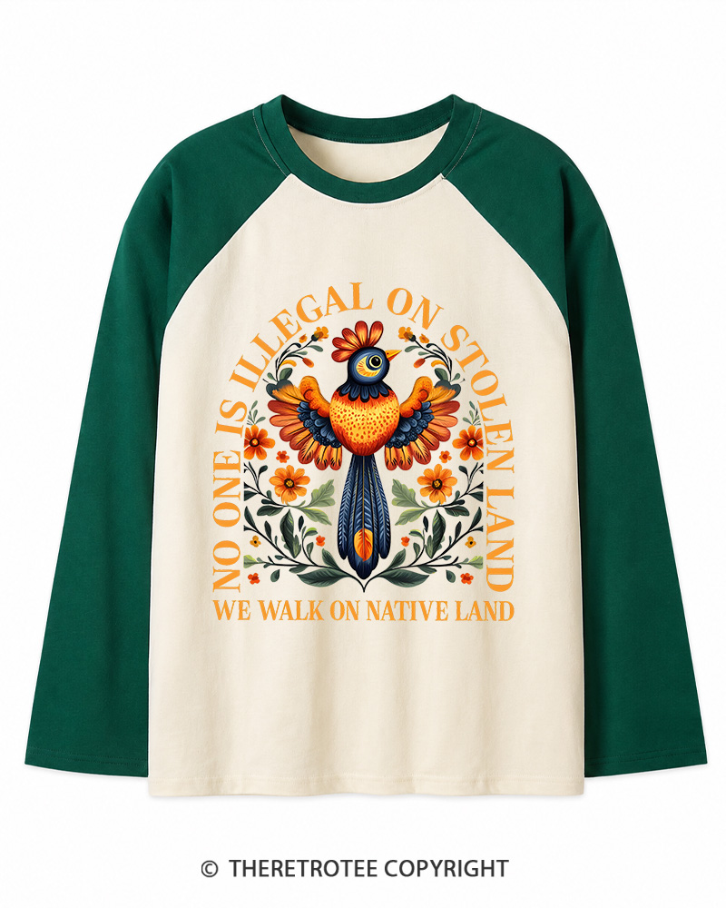 TheRetroTee No One Is Illegal On Stolen Land We Walk On Native Land Long Sleeve Raglan T-Shirt