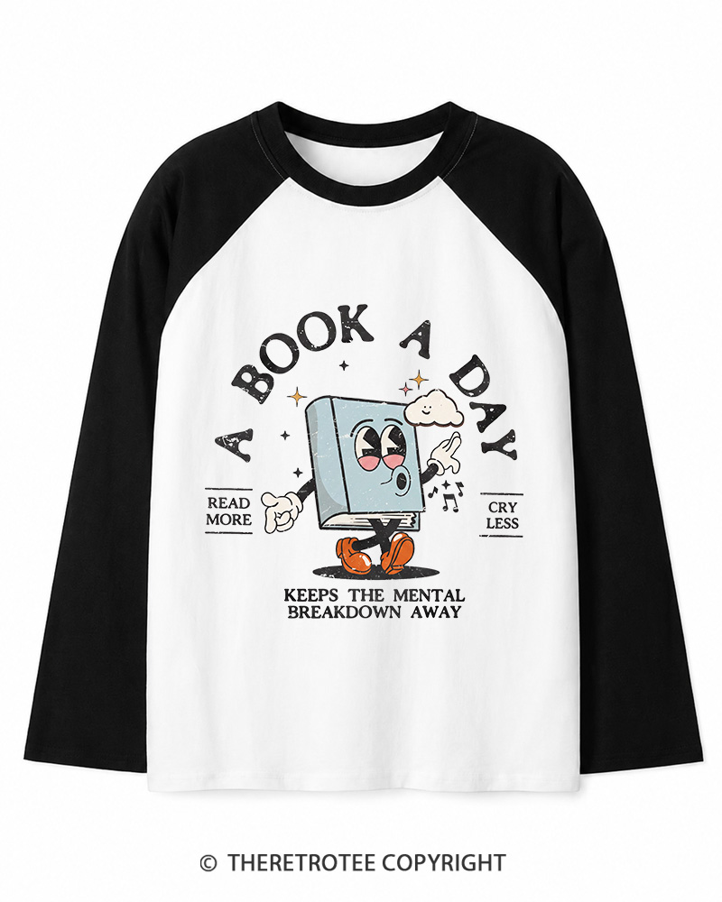 TheRetroTee A Book a Day Keeps The Mental Breakdown Away Long Sleeve Raglan T-Shirt