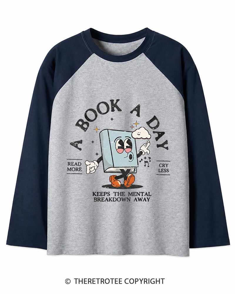 TheRetroTee A Book a Day Keeps The Mental Breakdown Away Long Sleeve Raglan T-Shirt