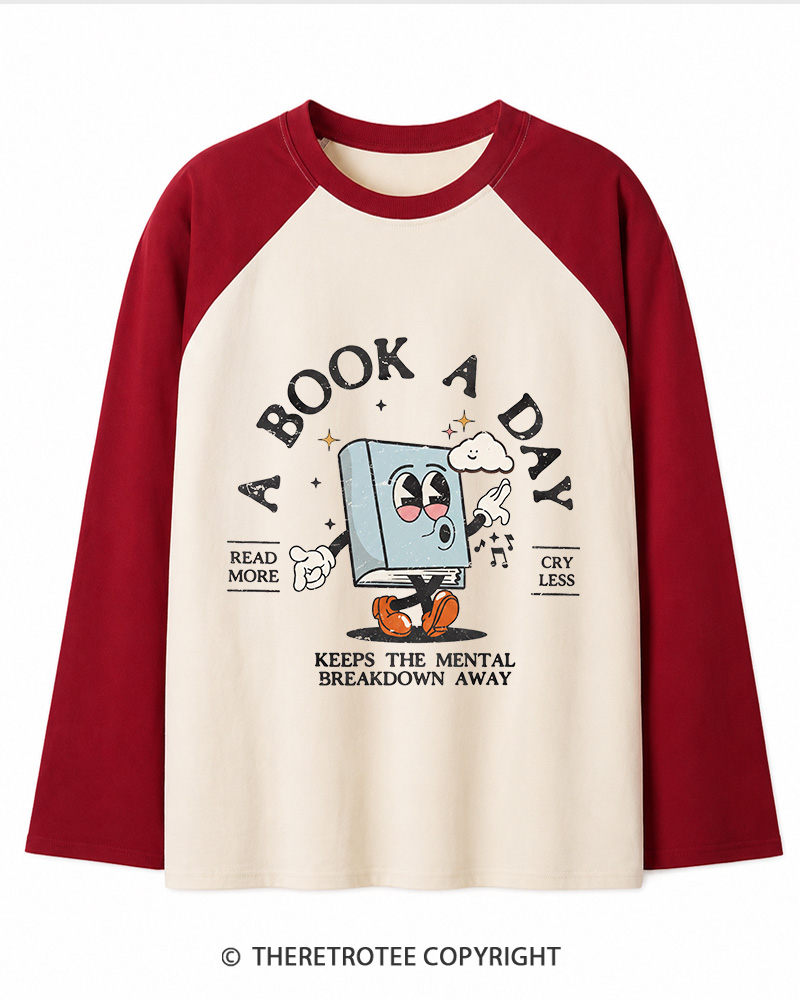 TheRetroTee A Book a Day Keeps The Mental Breakdown Away Long Sleeve Raglan T-Shirt