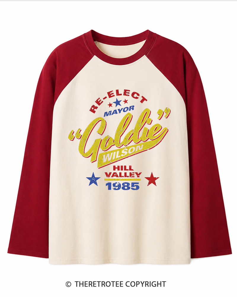 TheRetroTee Re-Elect Mayor Goldie Wilson 1980s Long Sleeve Raglan T-Shirt