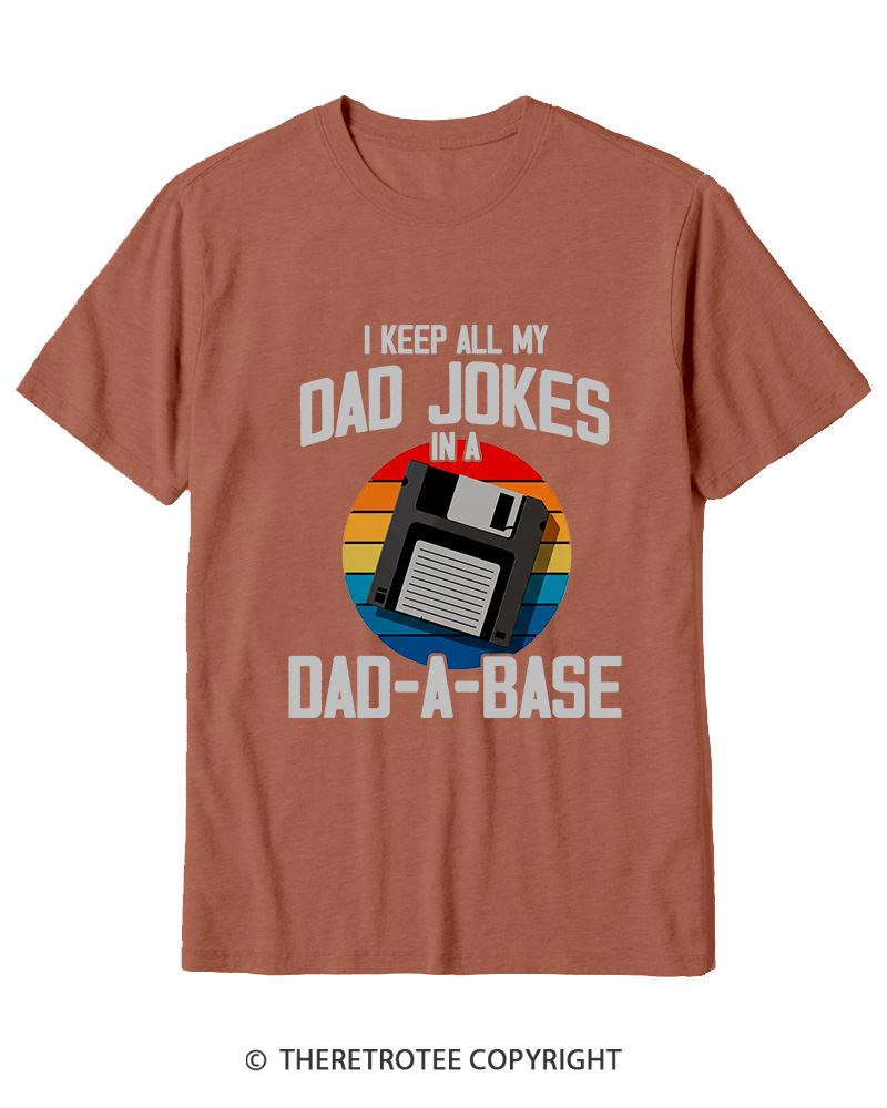 TheRetroTee I Keep All My Dad Jokes In A Dad-A-Base  1980s Cotton T-Shirt