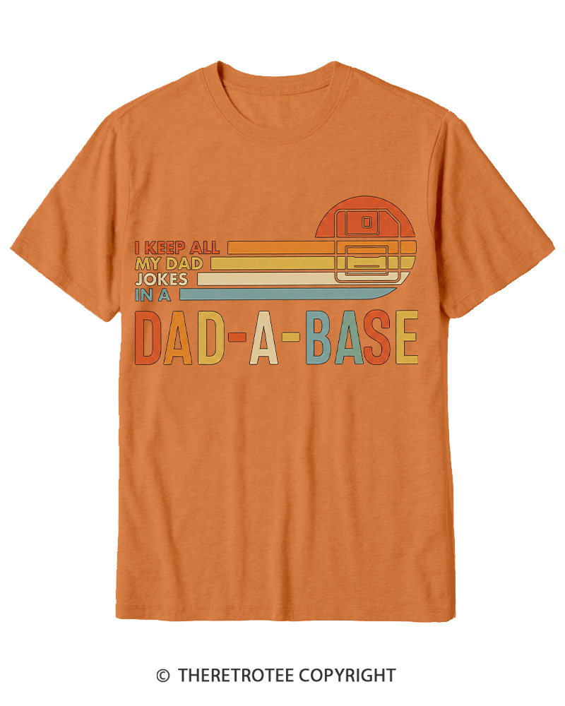 TheRetroTee I Keep All My Dad Jokes In A Dad-a-base 1970s Cotton T-Shirt