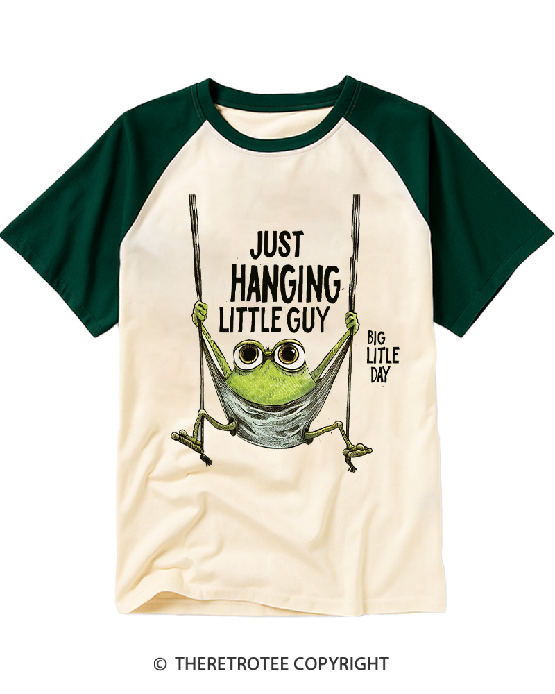 TheRetroTee Just Hanging Little Guy Frog Raglan Baseball T-Shirt
