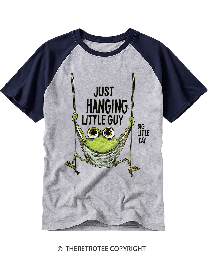 TheRetroTee Just Hanging Little Guy Frog Raglan Baseball T-Shirt