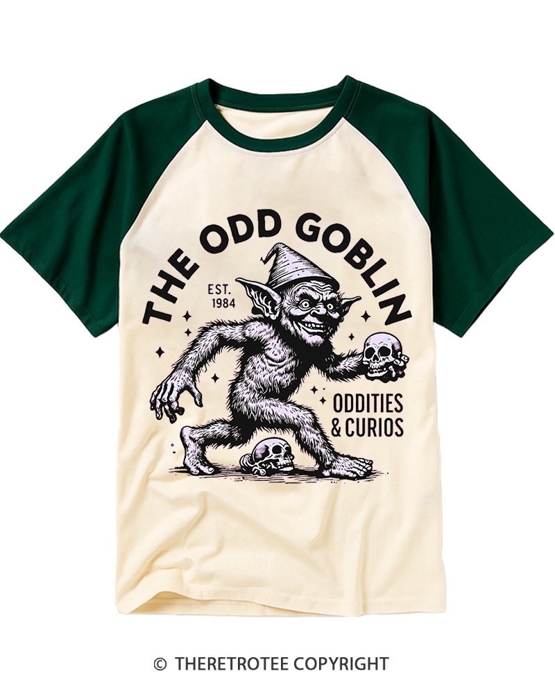 TheRetroTee The Odd Goblin Oddities and Curio Raglan Baseball T-Shirt