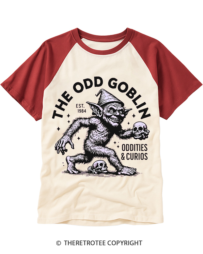 TheRetroTee The Odd Goblin Oddities and Curio Raglan Baseball T-Shirt