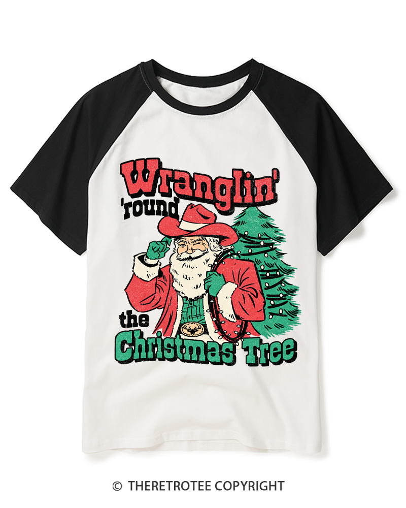 TheRetroTee Santa Wranglin Around 1970s Raglan Baseball T-Shirt