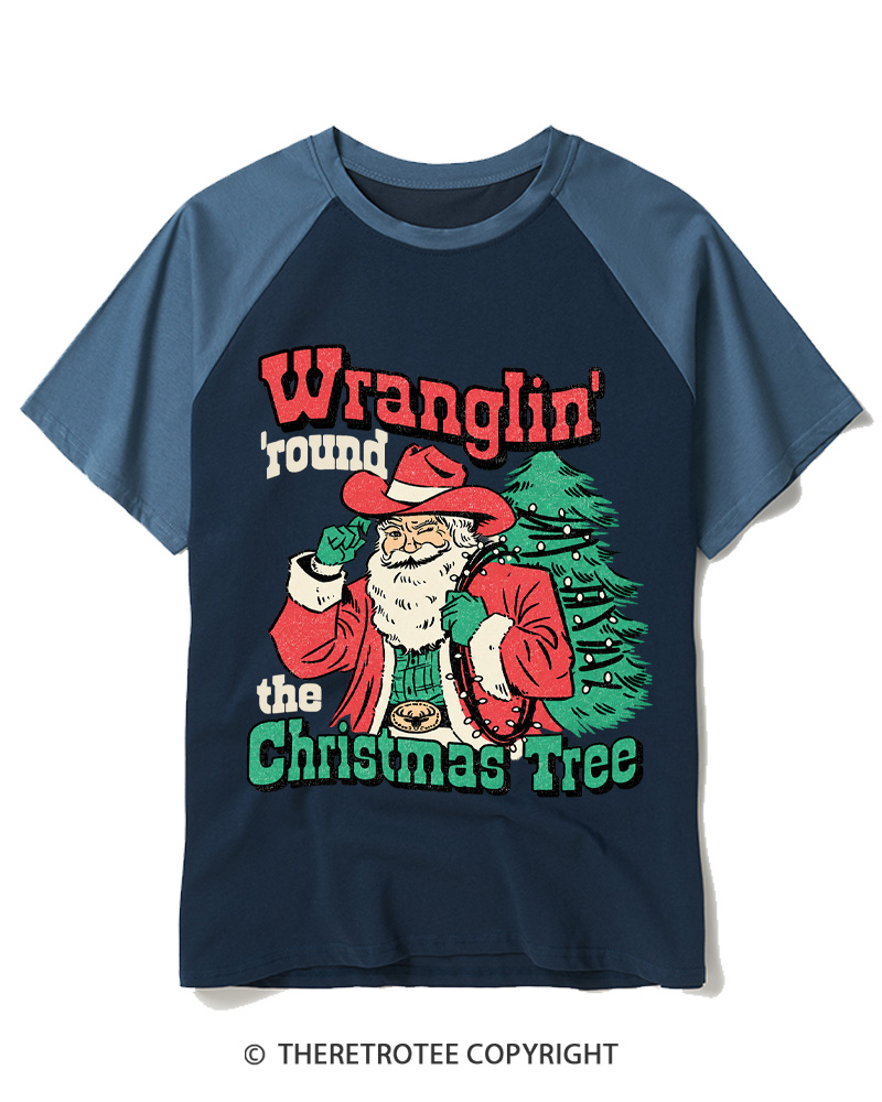 TheRetroTee Santa Wranglin Around 1970s Raglan Baseball T-Shirt
