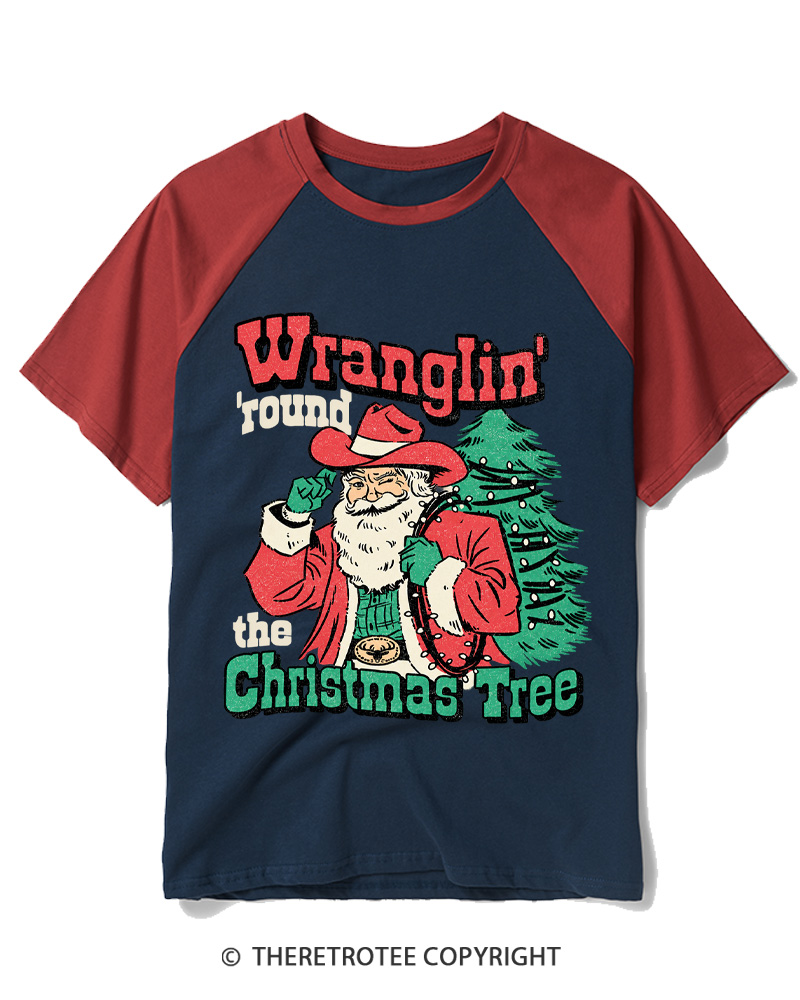 TheRetroTee Santa Wranglin Around 1970s Raglan Baseball T-Shirt