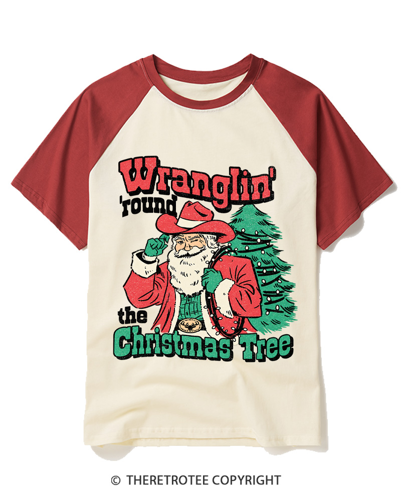 TheRetroTee Santa Wranglin Around 1970s Raglan Baseball T-Shirt