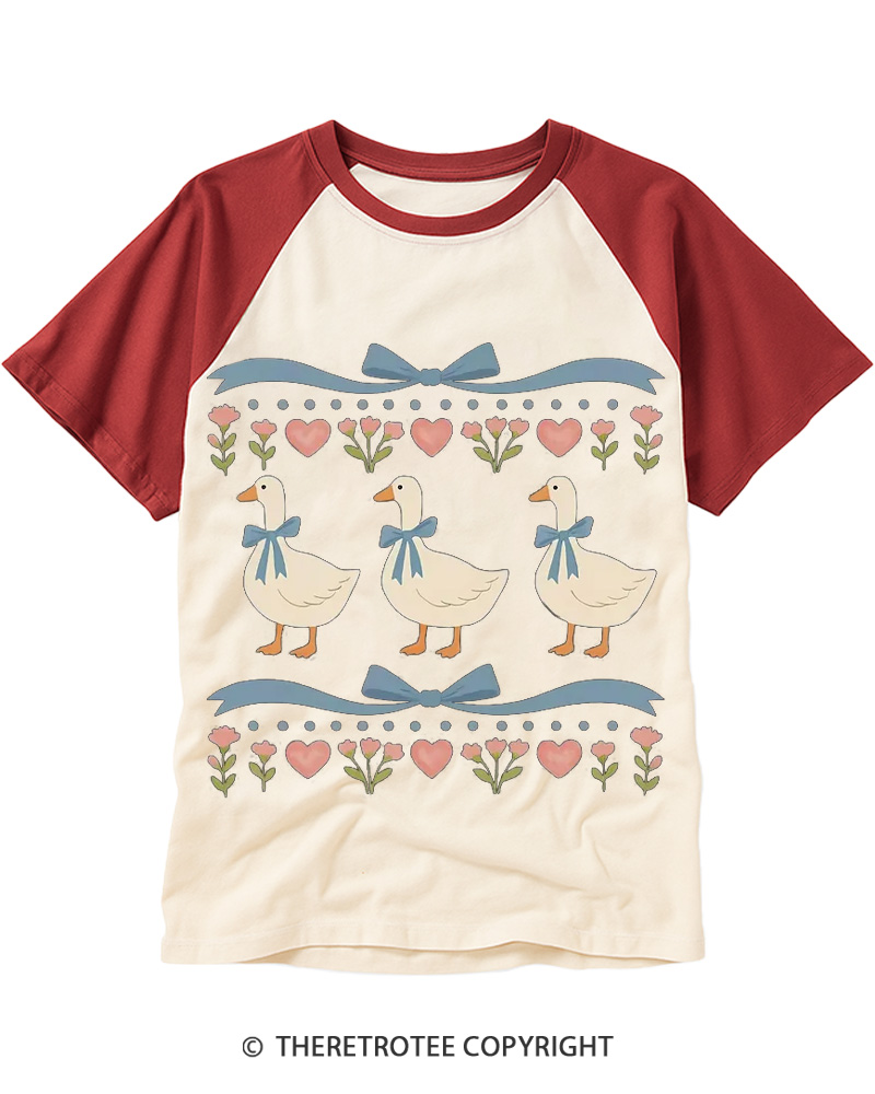 TheRetroTee 1980s Goose Raglan Baseball T-Shirt