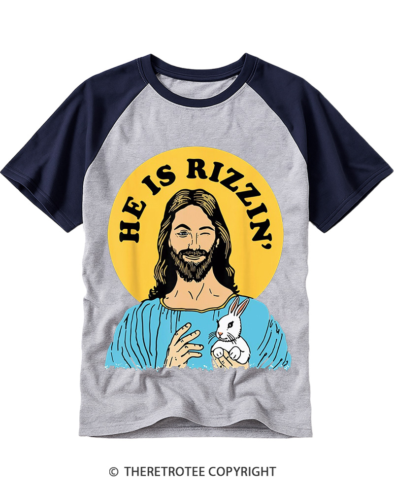 TheRetroTee He Is Rizzin Funny Jesus Christian Vintage Easter Raglan Baseball T-Shirt