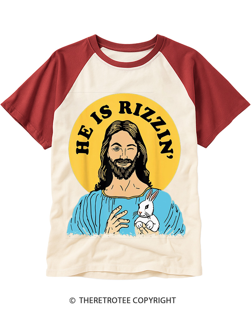 TheRetroTee He Is Rizzin Funny Jesus Christian Vintage Easter Raglan Baseball T-Shirt