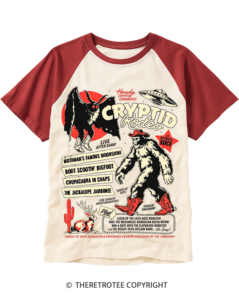 TheRetroTee Cryptid Rodeo Mothman Chupacabra Jackalope Cowboy 1970s Raglan Baseball T-Shirt