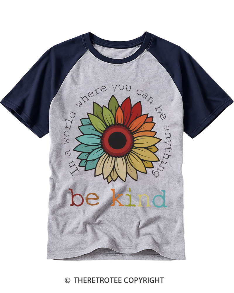 TheRetroTee In A World Where You Can Be Anything 1970s Raglan Baseball T-Shirt